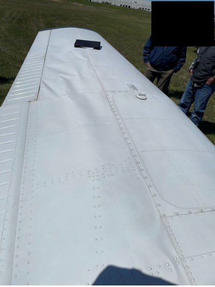 Photograph 2 – Left Wing Damage, from the NTSB investigation of Piper PA-28R-201 accident near West Chicago, Illinois, May 13, 2026