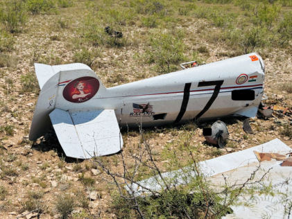 Photograph 9 – View of the pilot’s airplane flight helmet at the accident site, from the NTSB investigation of Cassutt IIIM accident near Odessa, Texas, July 5, 2026