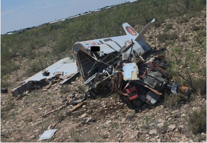 Photograph 3 – View of the fuselage and the engine at the accident site, from the NTSB investigation of Cassutt IIIM accident near Odessa, Texas, July 5, 2026