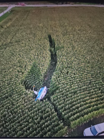 Photograph 1 – N322TC damage path, from the NTSB investigation of Robinson Helicopter Company R44 II accident near Coralville, Iowa, July 16, 2026