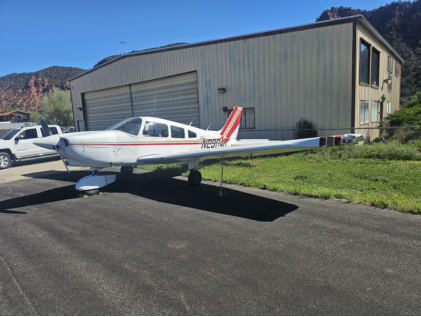 Photograph 1 – N2904R with left wing substantial damage, from the NTSB investigation of Piper PA-28-236 accident near Glenwood Springs, Colorado, May 3, 2026