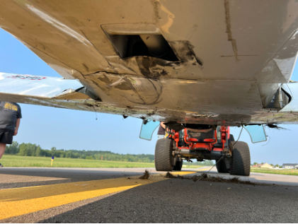 Photograph 1 – AFT Fuselage Damage, from the NTSB investigation of Vans RV8 accident near Linden, Michigan, August 3, 2026
