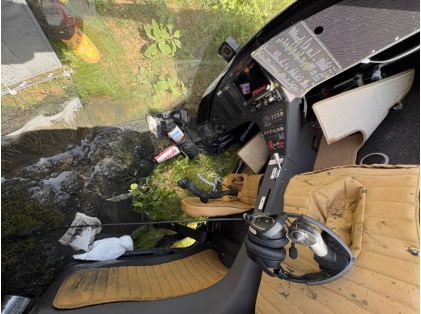 Photograph 4 – Cockpit, from the NTSB investigation of Rotor Effects LLC M24 PLUS accident near Waelder, Texas, August 15, 2026