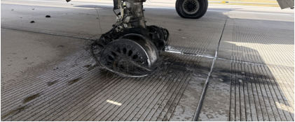 LMLG Tire and Wheel Failure City and County of Denver Department of Aviation Photo • View looking inboard • Left OB wheel partially intact, from the NTSB investigation of Boeing 737-8 accident near Denver, Colorado, July 26, 2025