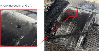 Left OB Wheel City and County of Denver Department of Aviation Photo • View looking down and aft, from the NTSB investigation of Boeing 737-8 accident near Denver, Colorado, July 26, 2025