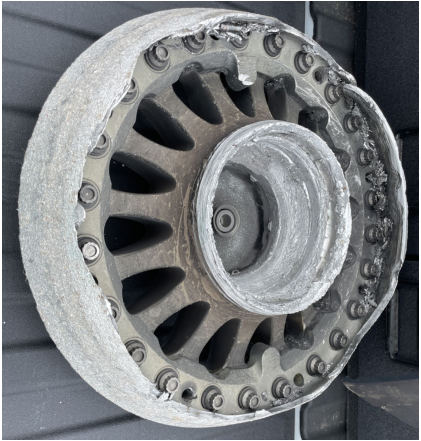Left IB Wheel NTSB Photo • Outer wheel half • Severe rolling abrasion, from the NTSB investigation of Boeing 737-8 accident near Denver, Colorado, July 26, 2025