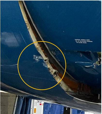 Photograph 2 – Damage to Door Frame, from the NTSB investigation of Boeing 737 accident near Kodiak, Alaska, January 15, 2026
