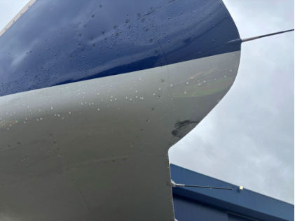Photo 1 – Minor damage to right wing. (Source Endeavor Air), from the NTSB investigation of Bombardier INC CL-600-2C10 incident near College Park, Georgia, February 26, 2026