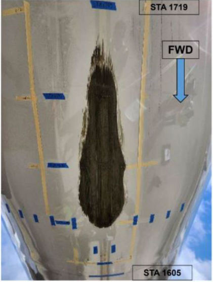 Photograph 2 – Damage to the lower fuselage between stations 1605 and 1719., from the NTSB investigation of Boeing 787 accident near Houston, Texas, February 27, 2026