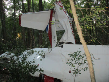 Photograph 2 – Top view of airplane showing fuselage and empennage damage, from the NTSB investigation of Cessna 150G accident near Cross Keys, New Jersey, September 14, 2023