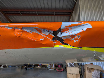 Photograph 2 – View of damage to the left wing leading edge., from the NTSB investigation of Amateur-built Vans RV-7 accident near Liberty, South Carolina, September 29, 2023