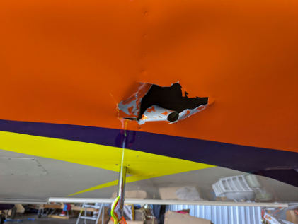 Photograph 3 – View of damage to the left wing., from the NTSB investigation of Amateur-built Vans RV-7 accident near Liberty, South Carolina, September 29, 2023