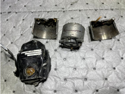 Photograph 6 – Turn and bank indicator after disassembly, from the NTSB investigation of Piper PA-28-180 accident near Micanopy, Florida, November 14, 2023