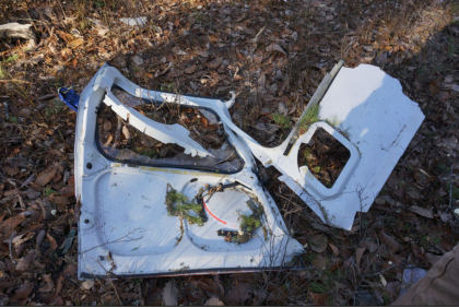 Photograph 7 – Portions of Cabin Door, from the NTSB investigation of American Eurocopter CORP AS350B2 accident near Hammonton, New Jersey, December 20, 2023