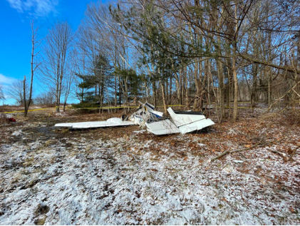 Photograph 3 – Rear View of Airplane at Accident Site, from the NTSB investigation of Beech 95-B55 (T42A) accident near Leyden, Massachusetts, January 14, 2024
