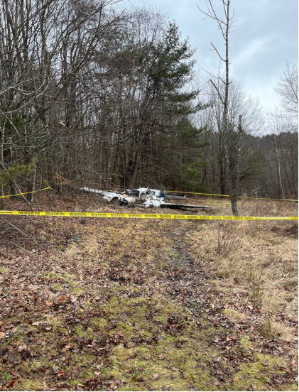 MA STATE POLICE INITIAL ON-SCENE PHOTOGRAPHS Photograph 1 – Front View of Airplane (Courtesy MA State Police), from the NTSB investigation of Beech 95-B55 (T42A) accident near Leyden, Massachusetts, January 14, 2024