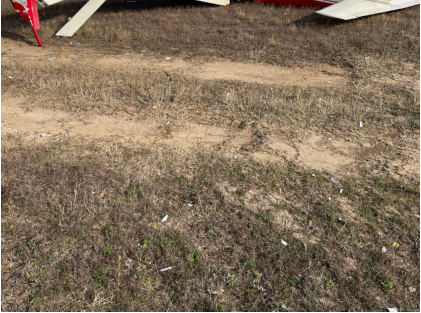 Photograph 6 – View of rear left side of airplane., from the NTSB investigation of Piper PA-24 accident near Eufaula, Alabama, January 31, 2024