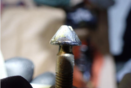 Photograph 9 – Main cabin door upper latch pin, from the NTSB investigation of Mooney M20K accident near St. Augustine, Florida, March 25, 2024