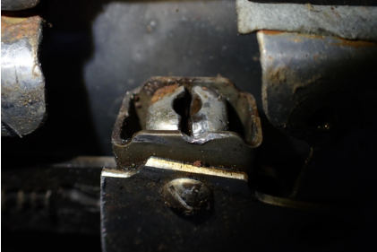 Photograph 8 – Main cabin door upper latch, from the NTSB investigation of Mooney M20K accident near St. Augustine, Florida, March 25, 2024