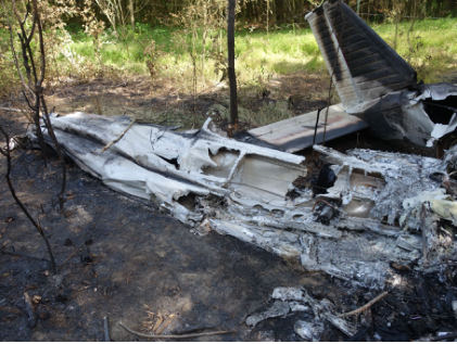 Photograph 3 – Impact and thermal damage noted to right wing., from the NTSB investigation of Piper PA28 accident near Siler City, North Carolina, June 14, 2024