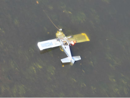Photograph 1 – Airplane in Merrimack River, from the NTSB investigation of Amateur-built RV6 accident near Methuen, Massachusetts, June 17, 2024