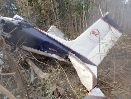 Photograph 3 – Empennage with damaged structure, damaged left horizontal stabilizer and elevator and wrinkling of the vertical stabilizer., from the NTSB investigation of Cessna 182 accident near Rutherfordton, North Carolina, July 8, 2024