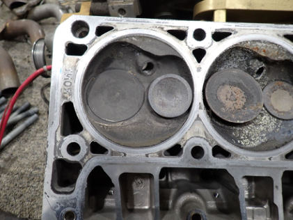 Photograph 11 – No. 1 cylinder head with valves, from the NTSB investigation of Williams John TITAN T-51 MUSTANG accident near Geneva, Ohio, July 21, 2024