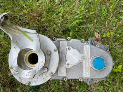 Photograph 3 – Propeller gearbox at accident site, from the NTSB investigation of Williams John TITAN T-51 MUSTANG accident near Geneva, Ohio, July 21, 2024