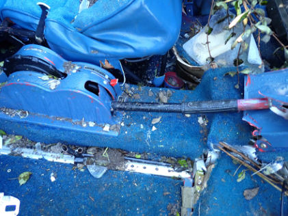 Photograph 3 – Flap control bar, from the NTSB investigation of Piper PA28R accident near Vergennes, Vermont, September 8, 2024