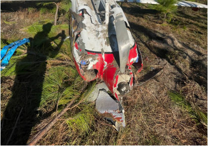 Photograph 1 – View of inverted airplane from front., from the NTSB investigation of Amateur-built IV accident near Perry, Florida, November 17, 2023