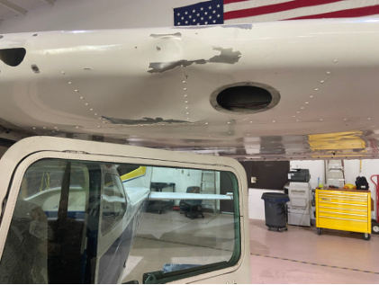 Photograph 1 – Impact Damage to Left Wing, from the NTSB investigation of Cessna 172 accident near Newport News, Virginia, December 11, 2023