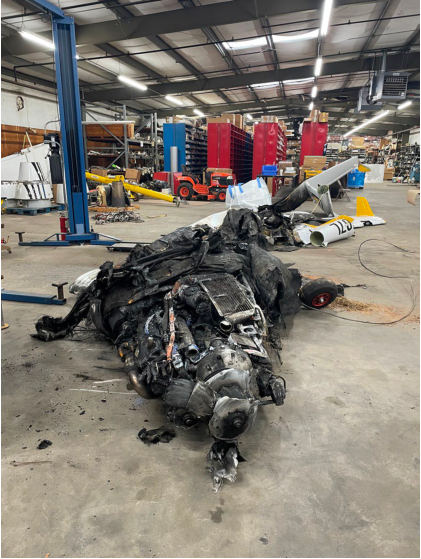 Photograph 1 – Front View of Airplane at Salvage Yard, from the NTSB investigation of Diamond Aircraft Ind INC DA 40 NG accident near Asheville, North Carolina, December 15, 2023