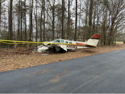 Photograph 1 – Airplane Damage Overview Left Side, from the NTSB investigation of Beech 58 accident near Griffin, Georgia, December 15, 2023