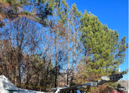 Photograph 2 – Airplane damage overview from right side, from the NTSB investigation of Cessna 172 accident near Mooresville, North Carolina, January 14, 2024