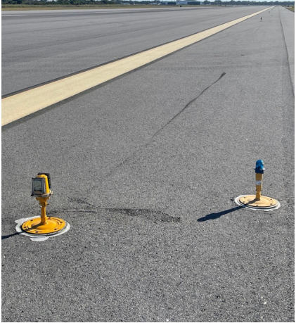 Photograph 2 – Impacted runway light location, from the NTSB investigation of Piper PA28 accident near Melbourne, Florida, February 13, 2024