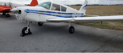 INVESTIGATIVE PHOTOS Photograph 2 – Damaged left wing., from the NTSB investigation of Piper PA28 accident near Greensboro, North Carolina, March 8, 2024
