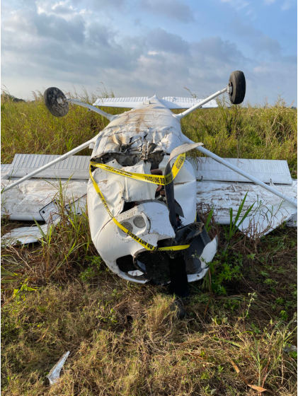 Photo 2 – Close up view of fuselage and wing damage., from the NTSB investigation of Cessna 172 accident near Homestead, Florida, March 9, 2024
