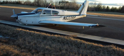 Photograph 1 – Photograph of airplane on runway, from the NTSB investigation of Piper PA24 accident near Stafford, Virginia, March 7, 2024