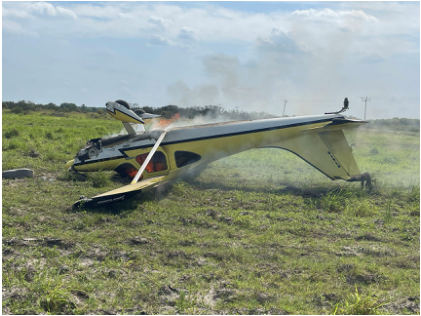 INVESTIGATIVE PHOTOS Photograph 1 – Airplane on fire., from the NTSB investigation of Amateur-built Sportsman 2+2 accident near Fort Meade, Florida, March 14, 2024
