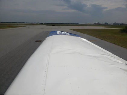 Photograph 5 – Right Wing Damage, from the NTSB investigation of Textron Aviation INC 172S accident near Melbourne, Florida, March 15, 2024