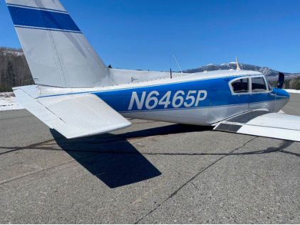 Photograph 3 – Rear Right Side View of Airplane on Runway, from the NTSB investigation of Piper PA-24-250 accident near Carrabassett, Maine, April 8, 2024