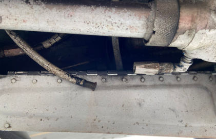 Photograph 3 – Separated Hydraulic Hose, from the NTSB investigation of Cessna 210 accident near Concord, North Carolina, April 12, 2024