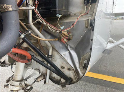 Photograph 7 – Overview of Firewall and Surrounding Area, from the NTSB investigation of Cessna 172 accident near Stoneville, North Carolina, April 18, 2024