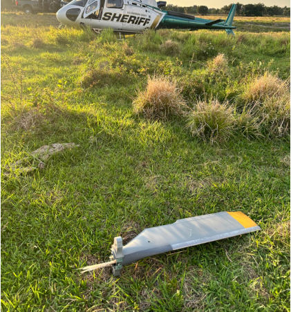 Photo 7 – View of Separated Red T/R Blade as Found (HCSO), from the NTSB investigation of Airbus Helicopters INC AS350B3 accident near Plant City, Florida, May 1, 2024