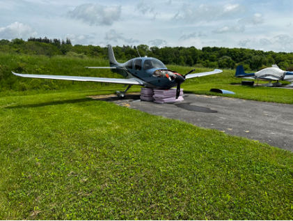 Photograph 2 – Digital Photograph From Repair Facility. Right Forward Quartering View of the Airplane Following Recovery, from the NTSB investigation of Cirrus Design CORP SR20 accident near Lagrangeville, New York, May 17, 2024