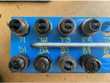 Photograph 10 – View of spark plugs., from the NTSB investigation of Piper PA-28-151 accident near Hope Mills, North Carolina, May 26, 2024