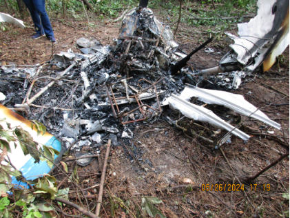 Photograph 2 – View of fuselage wreckage at the accident site., from the NTSB investigation of Piper PA-28-151 accident near Hope Mills, North Carolina, May 26, 2024