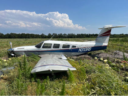 Photograph 2 – Left Side View of Main Wreckage, from the NTSB investigation of Piper PA32RT accident near Palmetto, Florida, May 30, 2024