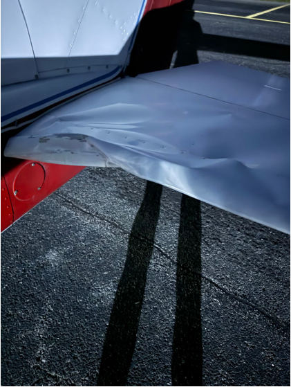 Photograph 2 – Close up view of damaged left horizontal stabilizer, from the NTSB investigation of Cessna 150 accident near Fayetteville, Tennessee, May 31, 2024