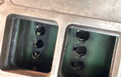 Photograph 9 – Compressor Bleed Valve Holes (NTSB Photo), from the NTSB investigation of Temco/Lazier TT-1 accident near Laurel Hill, Florida, June 1, 2024